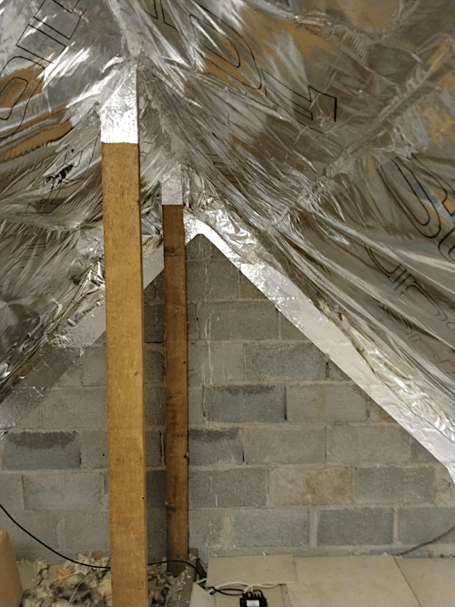 Warm loft bedroom after insulation Halifax